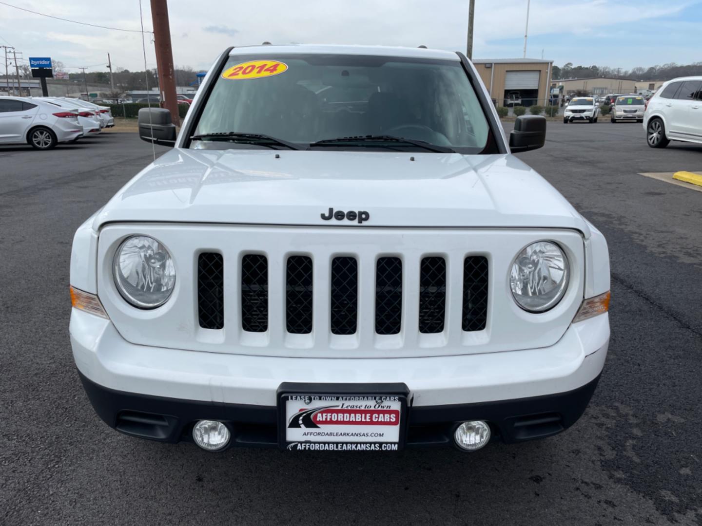 2014 White Jeep Patriot (1C4NJPBAXED) with an 4-Cyl, 2.0 Liter engine, Automatic, 6-Spd w/AutoStick transmission, located at 8008 Warden Rd, Sherwood, AR, 72120, (501) 801-6100, 34.830078, -92.186684 - Photo#2